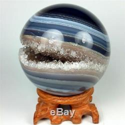 3.45 Polished agate sphere with crystal cluster center withwood Stand Brazil A227